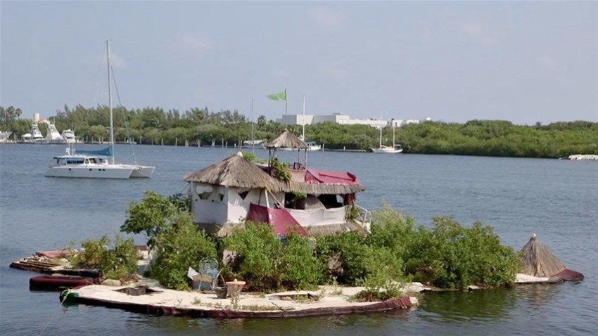 Man Builds Floating Tropical Island Paradise on 150,000 Recycled Plastic Bottles